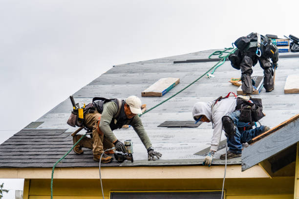 Professional Gutter Installation technician working in West Sand Lake, NY